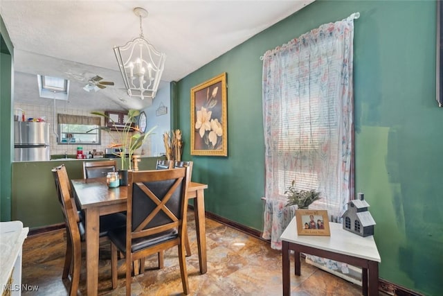 3069 Elyria Ave, Lorain, OH 44055 - dining area with a chandelier