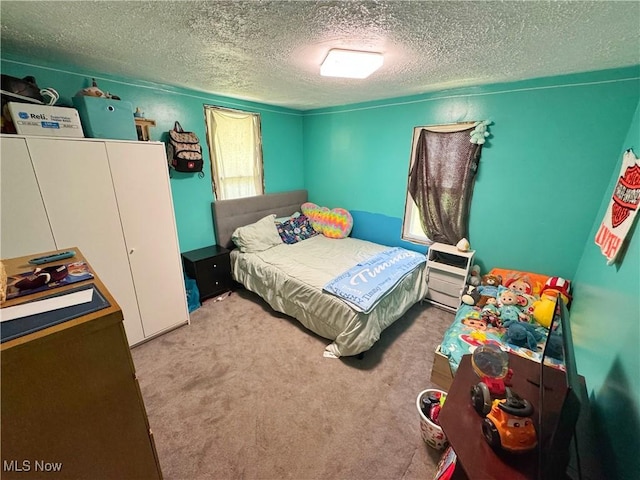 78 Findley St, Dillonvale, OH 43917 - carpeted bedroom with a textured ceiling