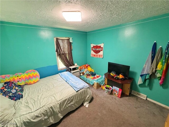 78 Findley St, Dillonvale, OH 43917 - bedroom with a textured ceiling and carpet flooring