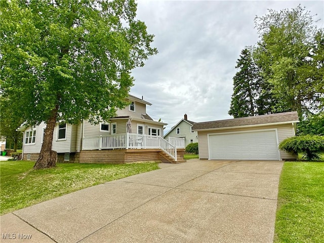 177 N Cleveland Ave, Mogadore, OH 44260 - view of front of home featuring a front lawn and a garage