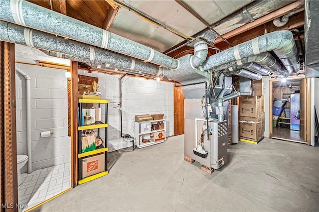 131 E 206th St, Euclid, OH 44123 - unfinished basement with heating unit, gas water heater, and concrete block wall