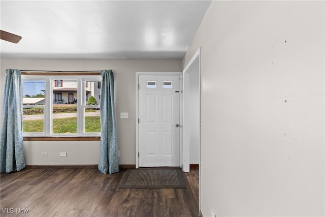 60620 Main St, Jacobsburg, OH 43933 - foyer featuring wood finished floors, baseboards, and ceiling fan