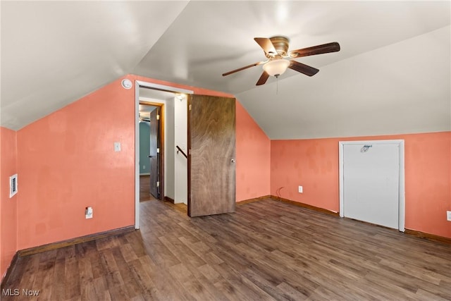 60620 Main St, Jacobsburg, OH 43933 - additional living space featuring ceiling fan, wood finished floors, vaulted ceiling, and baseboards