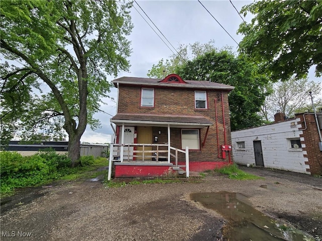 958 E Wilbeth Rd, Akron, OH 44306 - view of front of home featuring a porch and brick siding