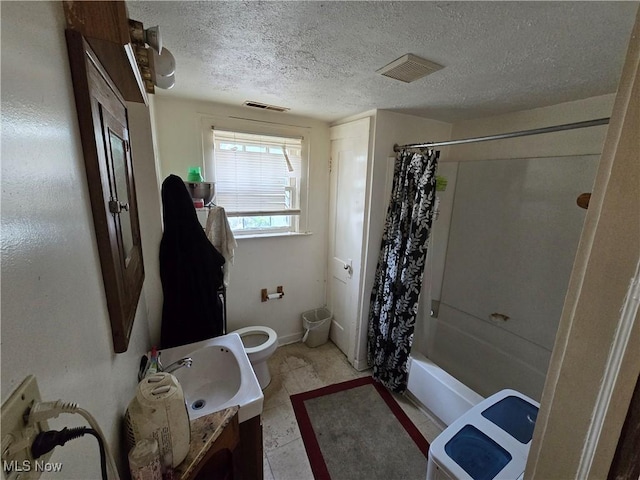 958 E Wilbeth Rd, Akron, OH 44306 - bathroom with shower / bath combo with shower curtain, vanity, a textured ceiling, and tile patterned floors