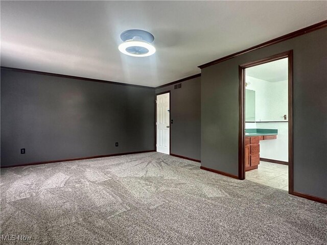 95 Cheyenne Dr, Girard, OH 44420 - empty room featuring ornamental molding and light carpet