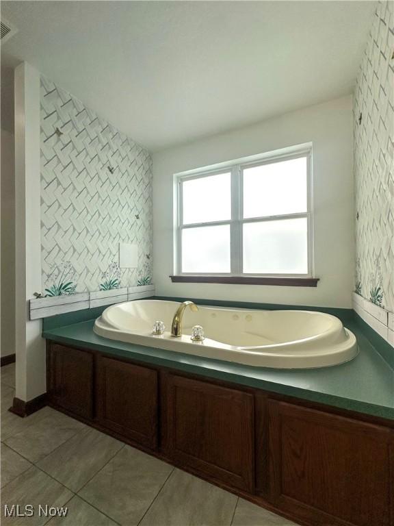 95 Cheyenne Dr, Girard, OH 44420 - full bath with tile patterned flooring, a bath, and wallpapered walls