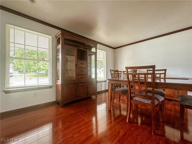 95 Cheyenne Dr, Girard, OH 44420 - dining area featuring ornamental molding and wood finished floors