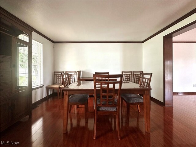 95 Cheyenne Dr, Girard, OH 44420 - dining room featuring wood finished floors and ornamental molding