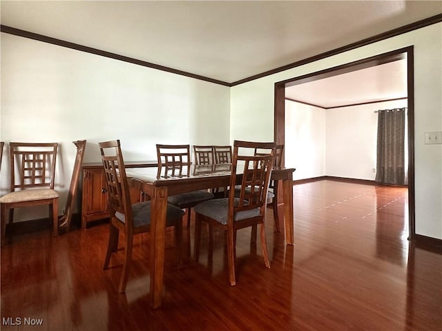 95 Cheyenne Dr, Girard, OH 44420 - dining space featuring ornamental molding and dark wood-style floors