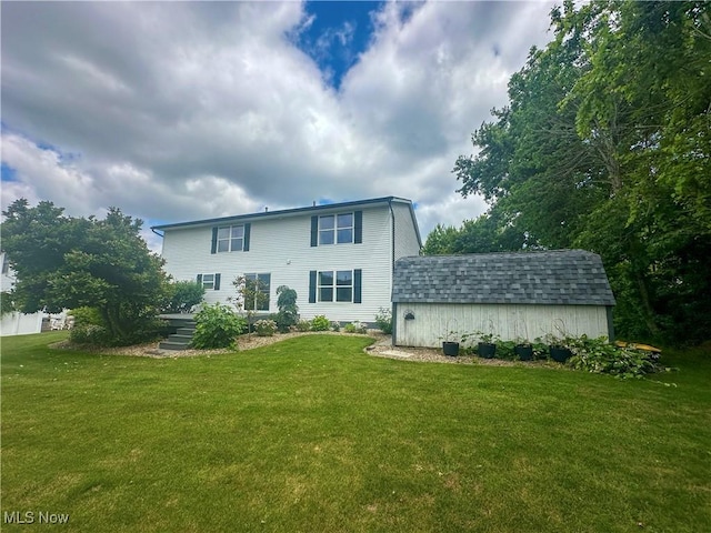 95 Cheyenne Dr, Girard, OH 44420 - back of house featuring a yard