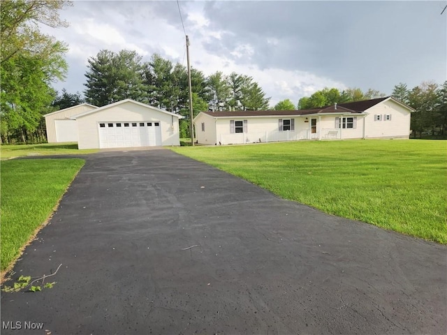 5747 E Clinton St, Albany, OH 45710 - ranch-style home with a detached garage, an outdoor structure, and a front yard