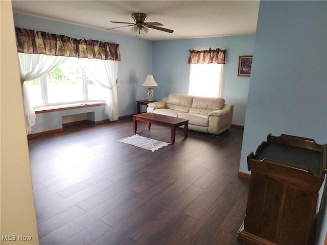 5747 E Clinton St, Albany, OH 45710 - living area with healthy amount of natural light, ceiling fan, dark wood-style flooring, and baseboards