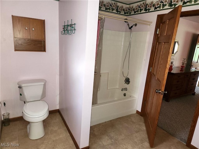 5747 E Clinton St, Albany, OH 45710 - full bath featuring bathtub / shower combination, baseboards, toilet, tile patterned floors, and vanity