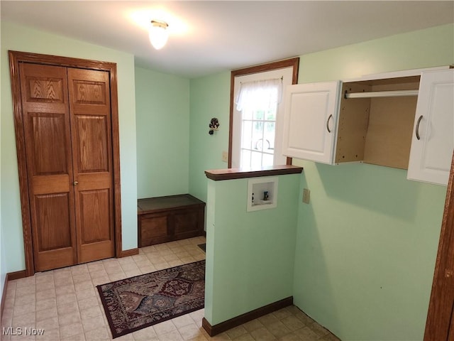 5747 E Clinton St, Albany, OH 45710 - washroom featuring washer hookup, cabinet space, and baseboards