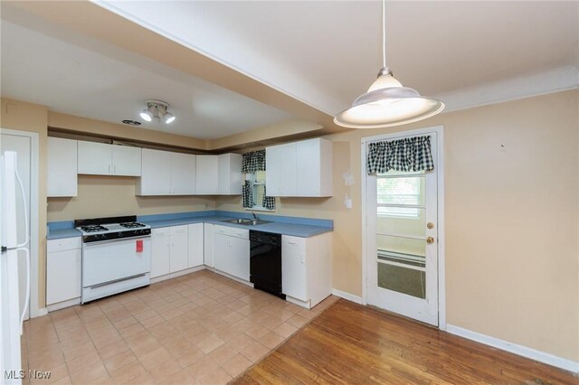 14245 Cedar Rd, South Euclid, OH 44121 - kitchen featuring white appliances, white cabinetry, and baseboards