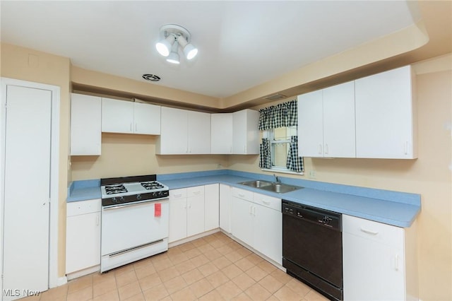 14245 Cedar Rd, South Euclid, OH 44121 - kitchen featuring dishwasher, white gas range oven, a sink, white cabinets, and light tile patterned floors