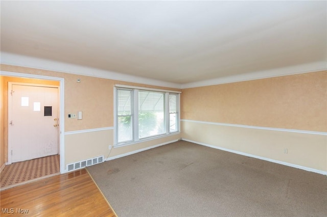 14245 Cedar Rd, South Euclid, OH 44121 - empty room with baseboards and wood finished floors