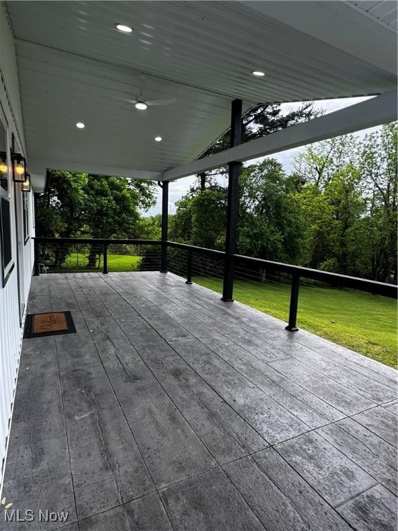 47423 Centerville Jacobsburg Rd, Jacobsburg, OH 43933 - wooden deck with a yard and a ceiling fan