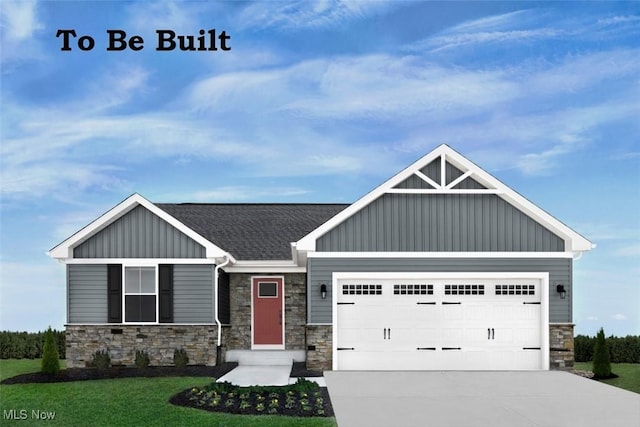 149 Hidden Village Dr Unit S/L 152, Perry, OH 44081 - craftsman house with board and batten siding, stone siding, an attached garage, concrete driveway, and a front lawn