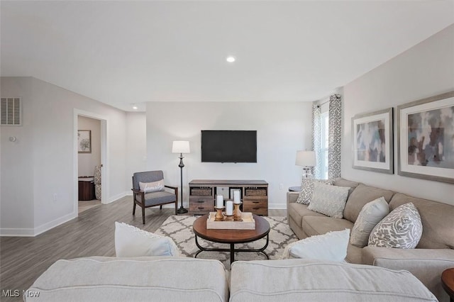 149 Hidden Village Dr Unit S/L 152, Perry, OH 44081 - living area with wood finished floors, baseboards, and recessed lighting