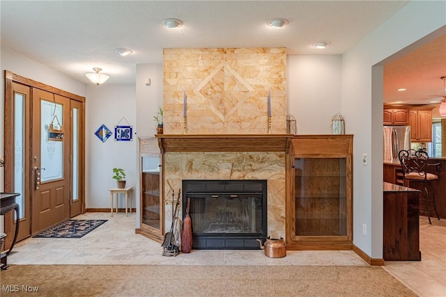 12075 State Route 700, Hiram, OH 44234 - foyer featuring baseboards and a large fireplace