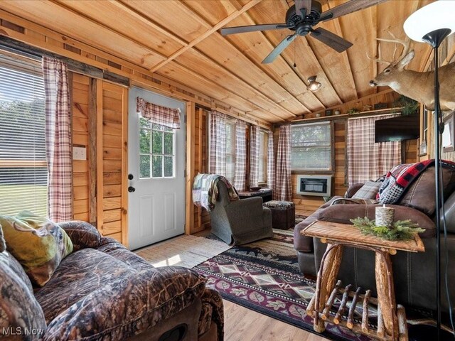 10664 W Little Kanawha Hwy, Mount Zion, WV 26151 - living room featuring wood ceiling, vaulted ceiling, wood finished floors, ceiling fan, and wooden walls