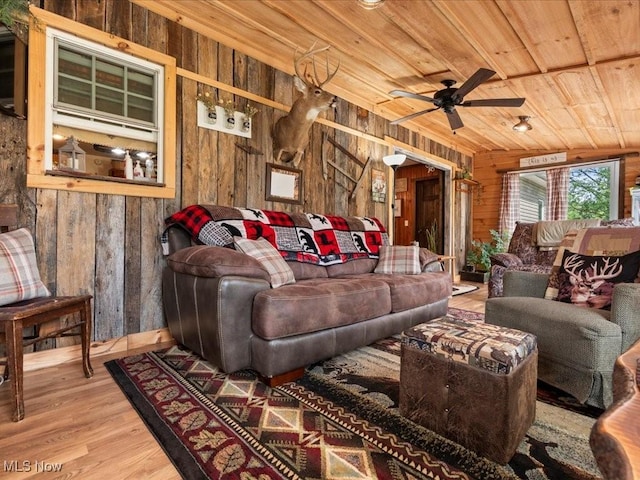 10664 W Little Kanawha Hwy, Mount Zion, WV 26151 - living room featuring wooden ceiling, wooden walls, wood finished floors, and a ceiling fan