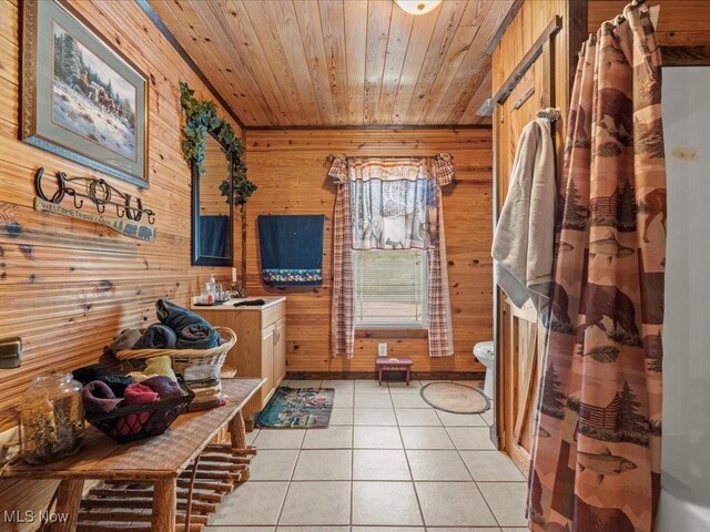 10664 W Little Kanawha Hwy, Mount Zion, WV 26151 - bathroom featuring wood walls, wooden ceiling, tile patterned floors, a shower with shower curtain, and toilet