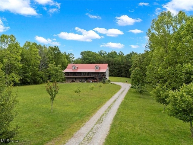 10664 W Little Kanawha Hwy, Mount Zion, WV 26151 - aerial view of property and surrounding area with a heavily wooded area
