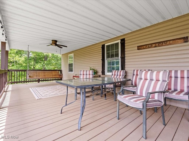 10664 W Little Kanawha Hwy, Mount Zion, WV 26151 - deck with outdoor dining space and a ceiling fan