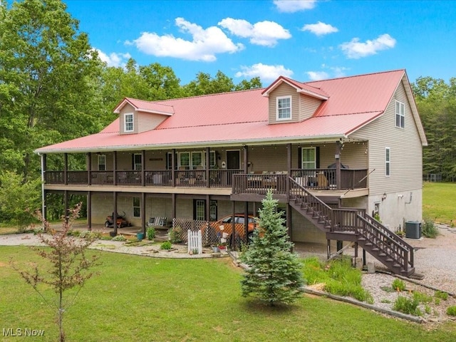 10664 W Little Kanawha Hwy, Mount Zion, WV 26151 - view of front of home featuring central AC unit, stairs, a front lawn, and metal roof