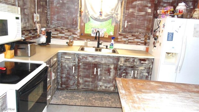 20296 Crk 6, Coshocton, OH 43812 - kitchen featuring white appliances, a sink, dark brown cabinets, and backsplash