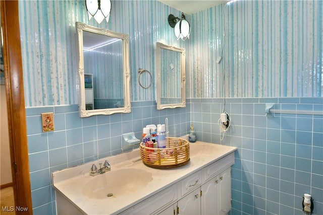 2816 E Market St, Warren, OH 44483 - bathroom featuring wallpapered walls and vanity