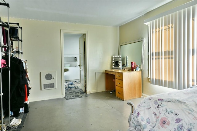 2816 E Market St, Warren, OH 44483 - bedroom with concrete floors and heating unit