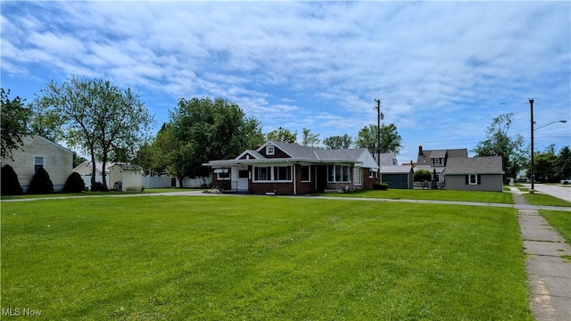 3205 State Rd, Ashtabula, OH 44004 - view of front of home with a front yard and covered porch
