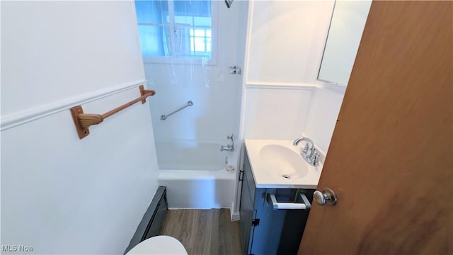 3205 State Rd, Ashtabula, OH 44004 - full bathroom featuring vanity, wood finished floors, and bathing tub / shower combination
