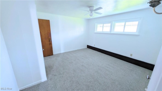 3205 State Rd, Ashtabula, OH 44004 - spare room featuring ceiling fan, carpet floors, and baseboards