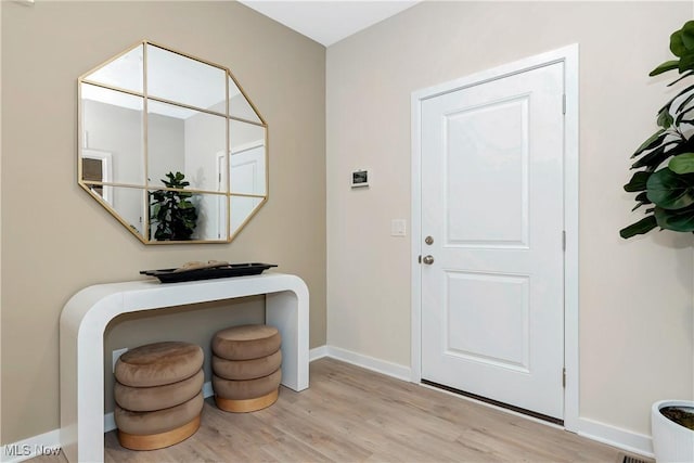 4367 Main St, Perry, OH 44081 - foyer featuring light wood-style flooring and baseboards
