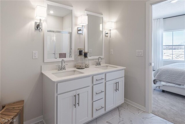 4367 Main St, Perry, OH 44081 - bathroom with baseboards, a stall shower, marble finish flooring, double vanity, and ensuite bath