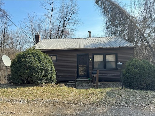 14240 Crk 410, Lot, Coshocton, OH 43812 - chalet / cabin featuring a chimney and metal roof