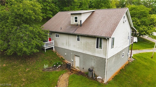 2993 Harris Hwy, Washington, WV 26181 - back of property with a lawn, central AC, a shingled roof, and a deck