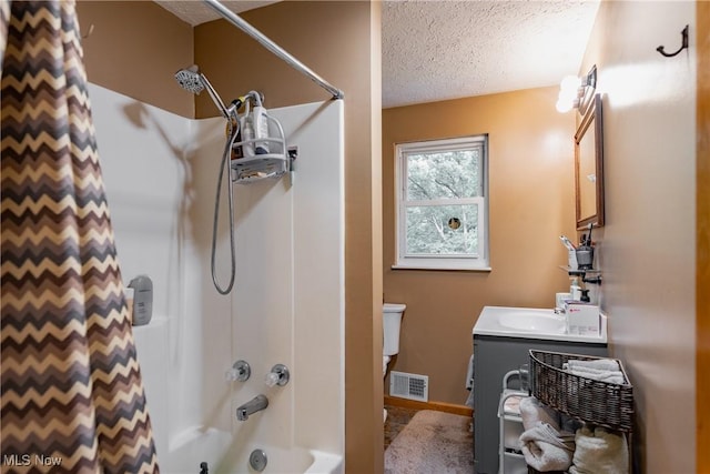 2993 Harris Hwy, Washington, WV 26181 - full bath with toilet, vanity, shower / tub combo with curtain, a textured ceiling, and baseboards