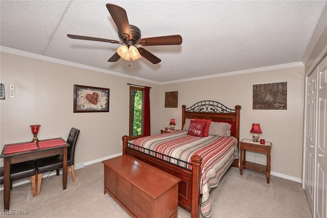 947 Trimble Pl, Sagamore Hills, OH 44067 - bedroom featuring light colored carpet, crown molding, baseboards, a textured ceiling, and a closet