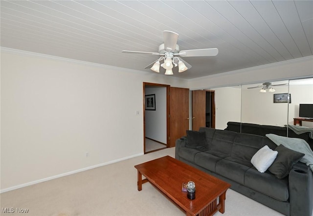 947 Trimble Pl, Sagamore Hills, OH 44067 - carpeted living room featuring a ceiling fan and crown molding