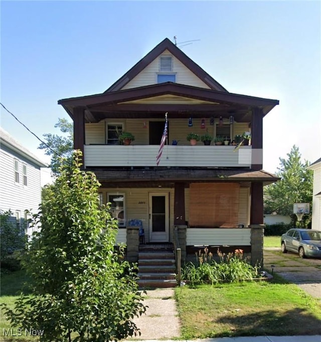 2215 Hood Ave, Cleveland, OH 44109 - view of front of property featuring a balcony and covered porch
