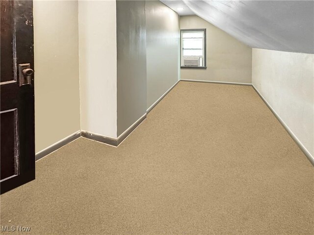14014 Sylvia Ave, Cleveland, OH 44110 - bonus room featuring vaulted ceiling, carpet, baseboards, and cooling unit