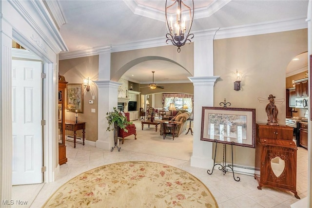 29 Amber Way, Norwalk, OH 44857 - entrance foyer with arched walkways, decorative columns, light tile patterned floors, ornamental molding, and ceiling fan