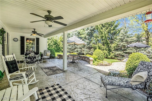 29 Amber Way, Norwalk, OH 44857 - view of patio with outdoor dining area and a ceiling fan