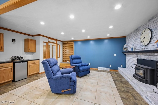 27539 Linwood Cir, North Olmsted, OH 44070 - living room with recessed lighting, crown molding, built in shelves, and baseboards